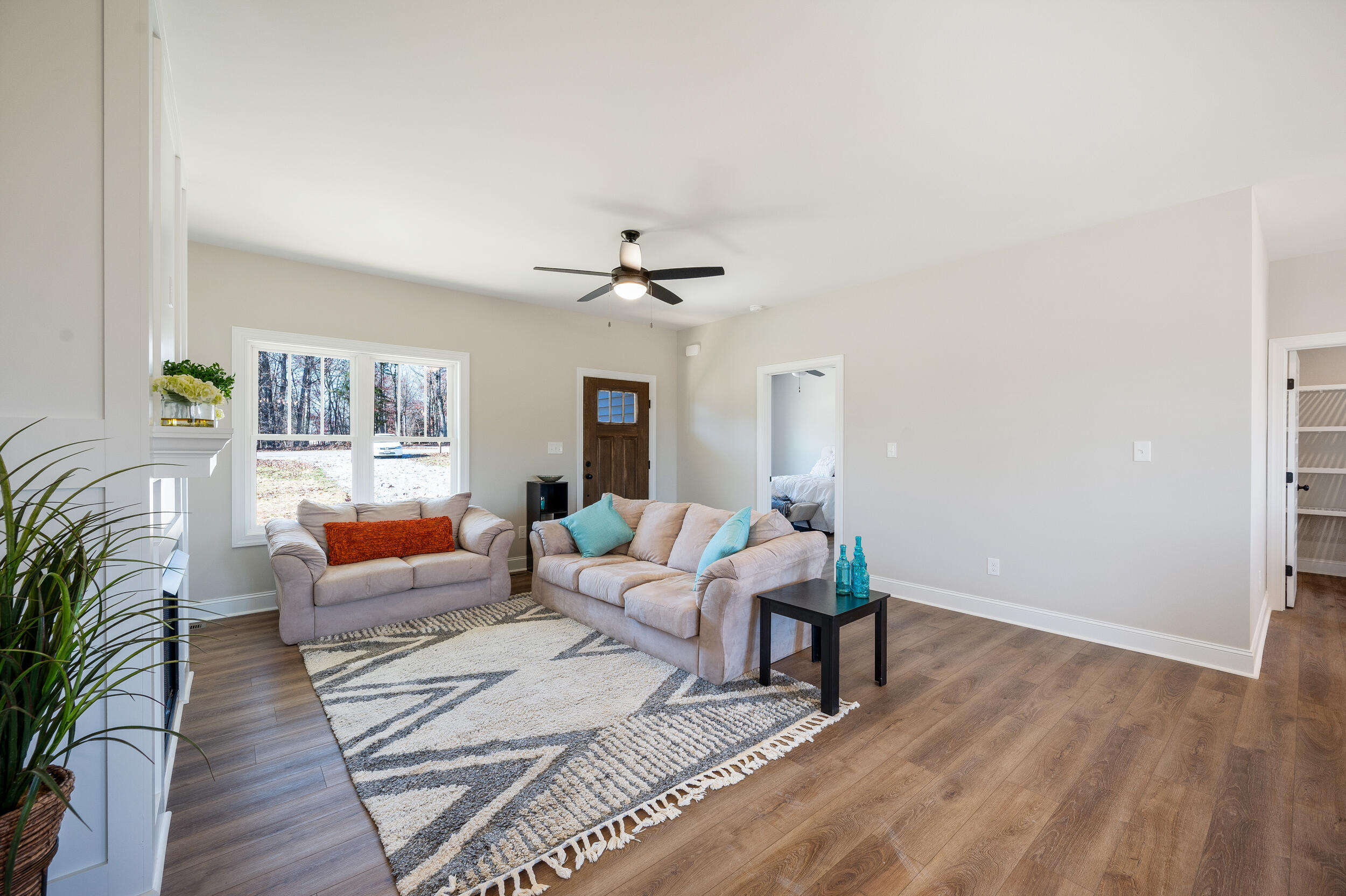 10510 Leesville Road Lynch Station, VA 24571 - Photo 6 of 60 a living room with furniture and wooden floor