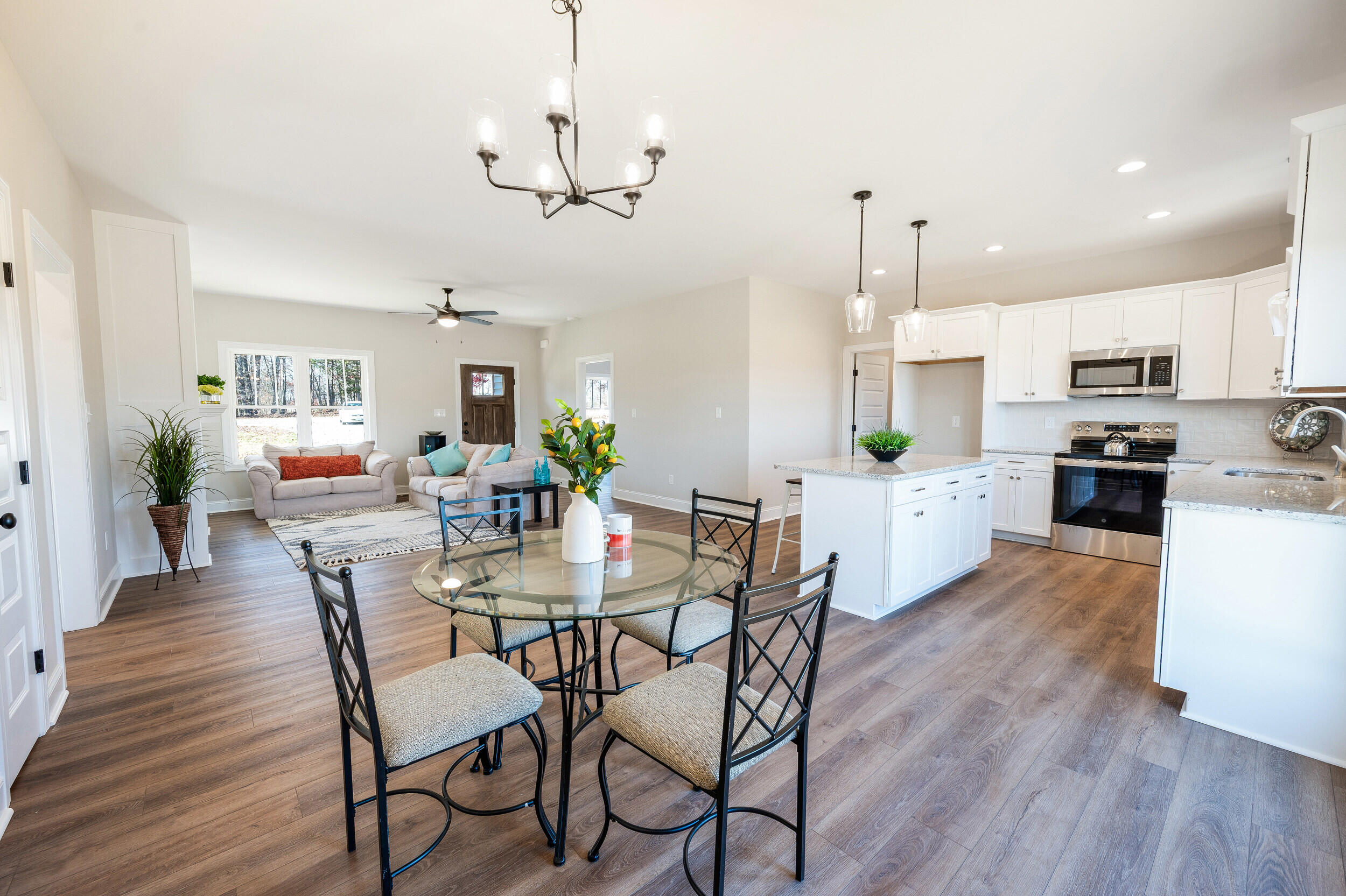 10510 Leesville Road Lynch Station, VA 24571 - Photo 8 of 60 a view of a dining room with furniture and wooden floor