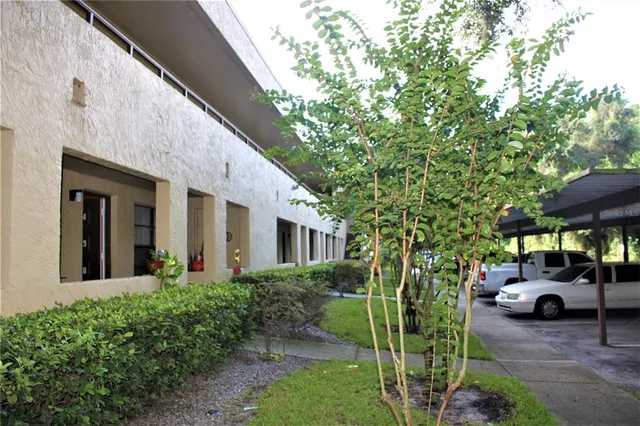 a view of a car parked in front of a building