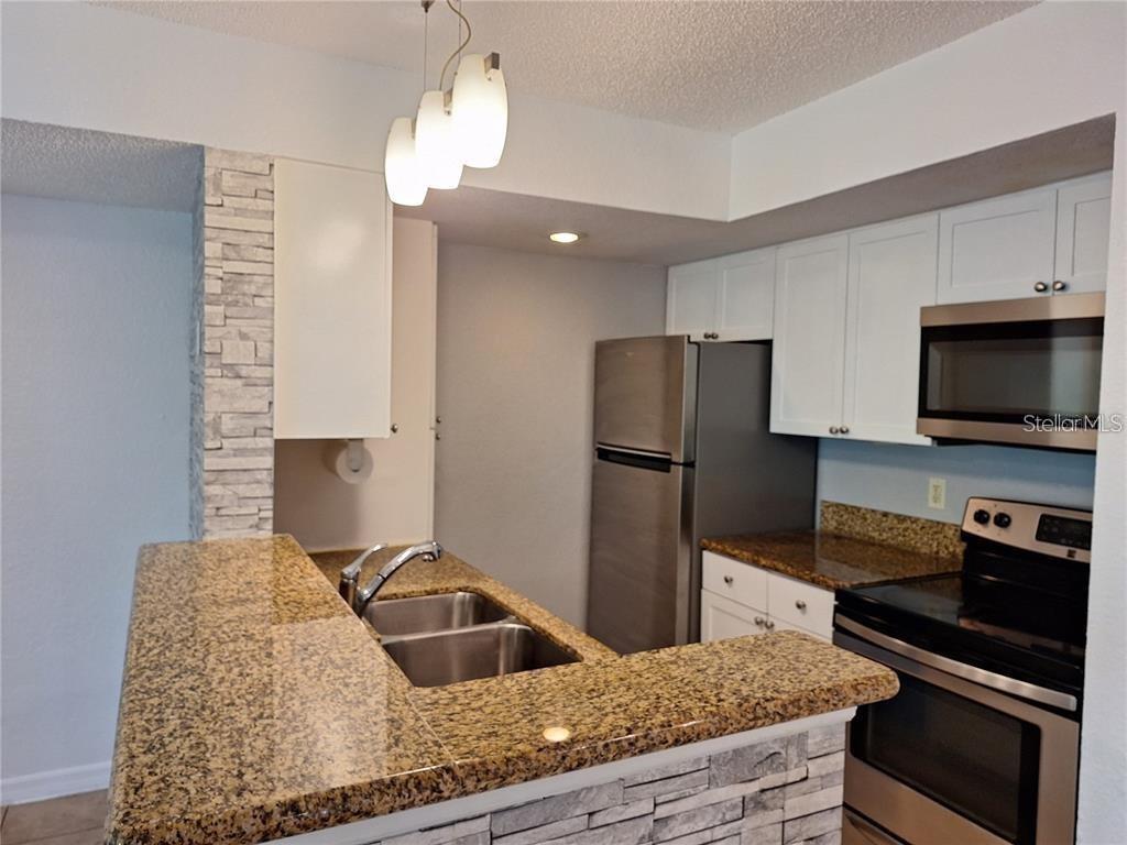 5116 Conroy Road, Unit 12 Orlando, FL 32811 - Photo 5 of 19