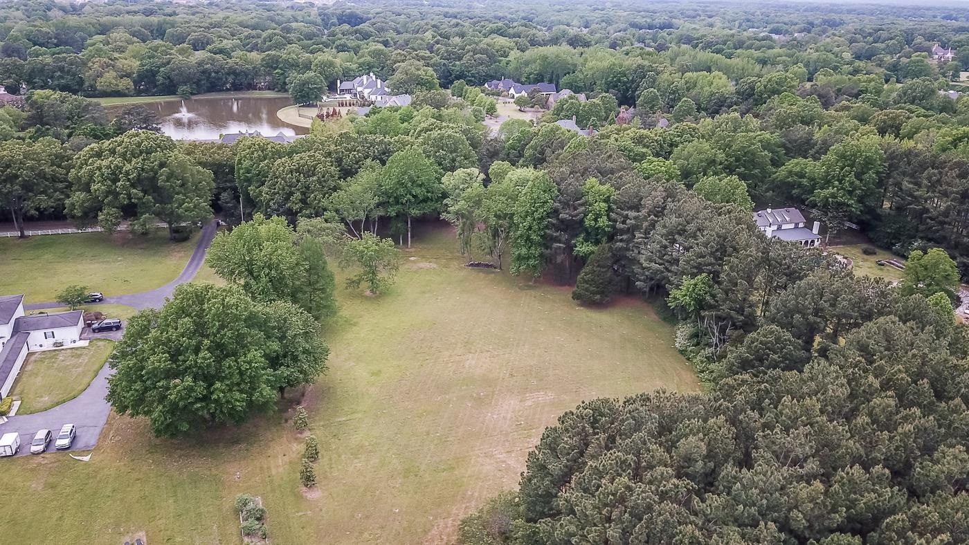 560 Bray Station Road Collierville, TN 38017 - Photo 4 of 4 an aerial view of residential house with outdoor space and lake view