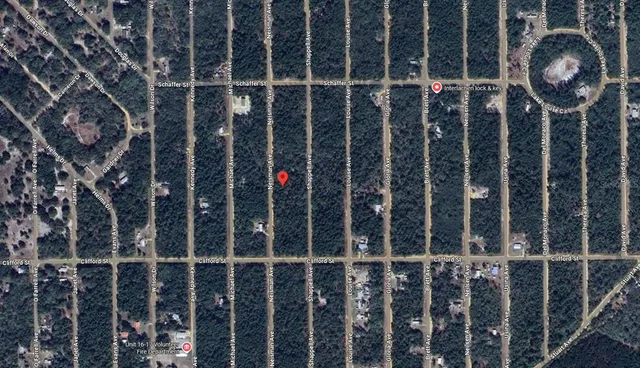 a view of a wooden door with a large window
