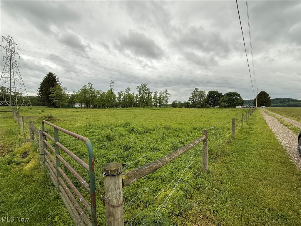6920 Riverside Road Southeast Gnadenhutten, OH 44629 - Photo 31 of 41 View of yard featuring a view of countryside