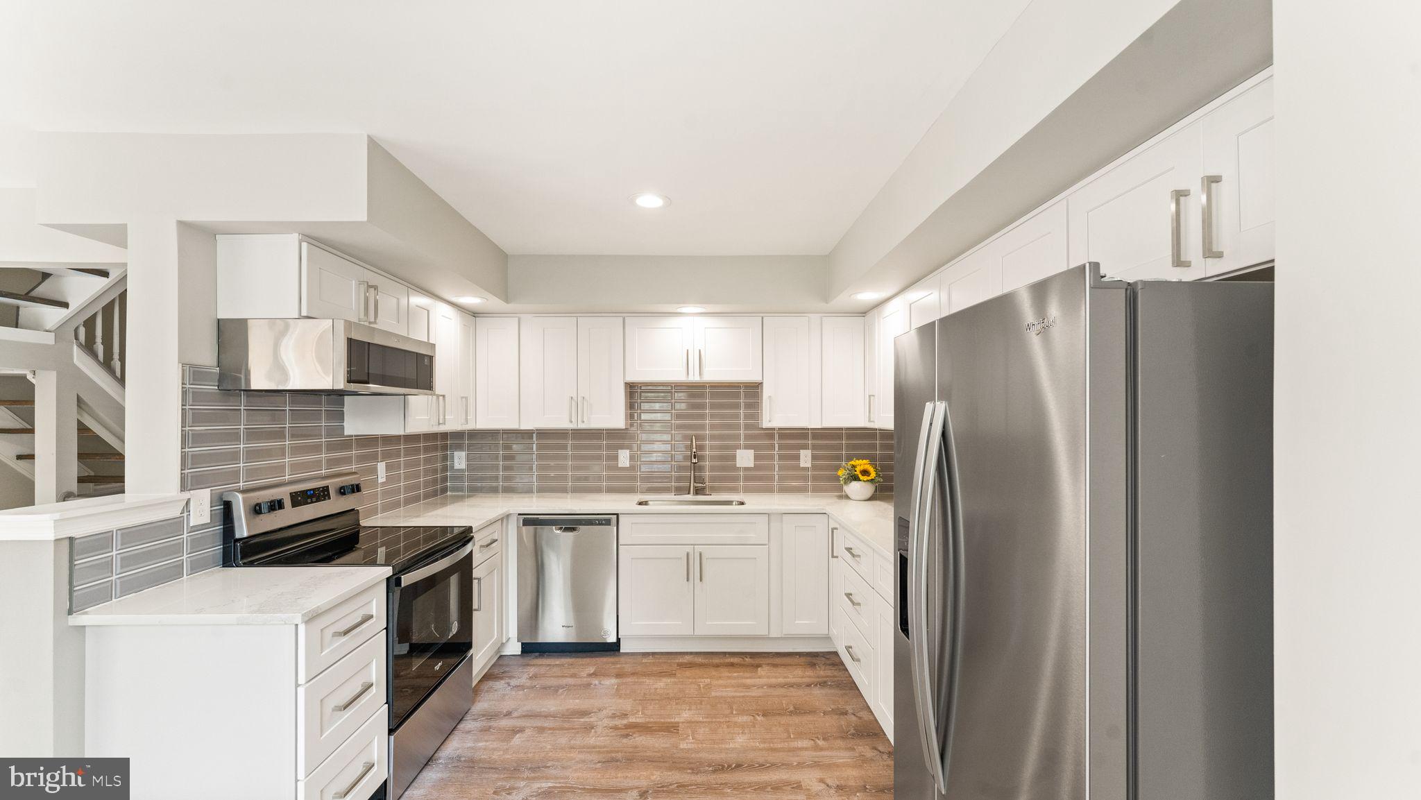21094 Cornerpost Square Ashburn, VA 20147 - Photo 5 of 76