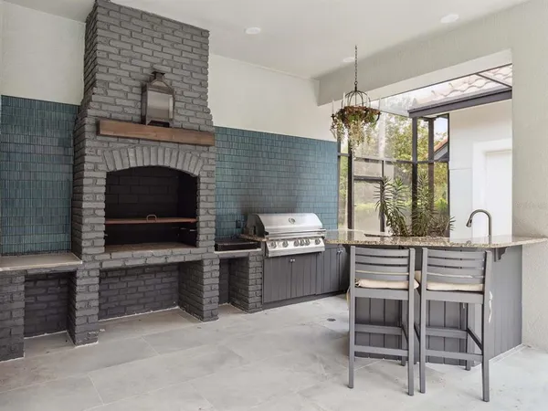 a kitchen with furniture and window