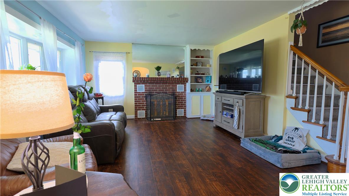 1345 Macada Road Bethlehem, PA 18017 - Photo 2 of 23 a living room with furniture and a flat screen tv