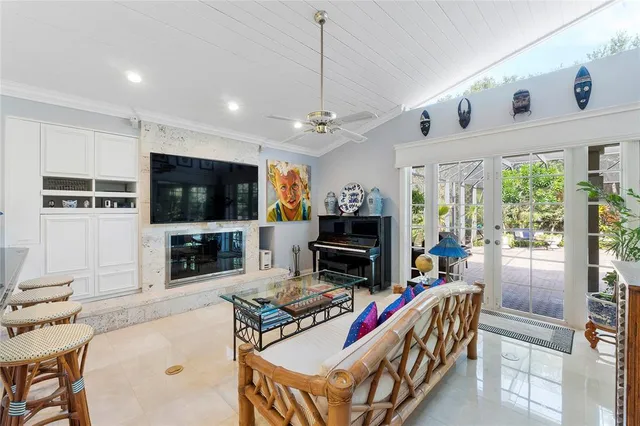 a bed room with a bed and a television