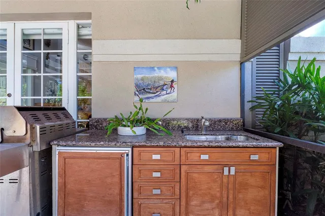 a view of a garden with a building in the background