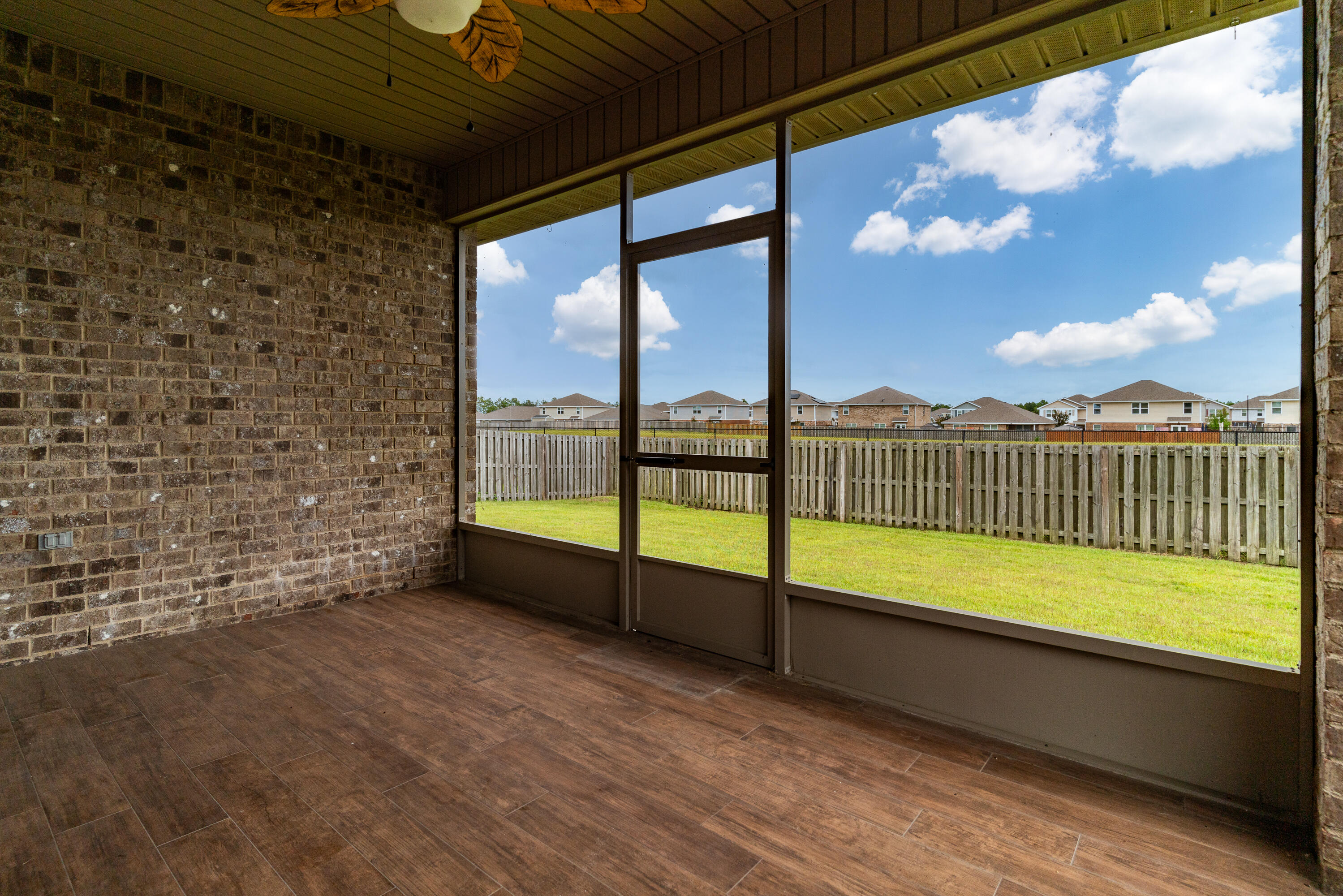 673 Teal Street Crestview, FL 32539 - Photo 4 of 25 Screened Lanai