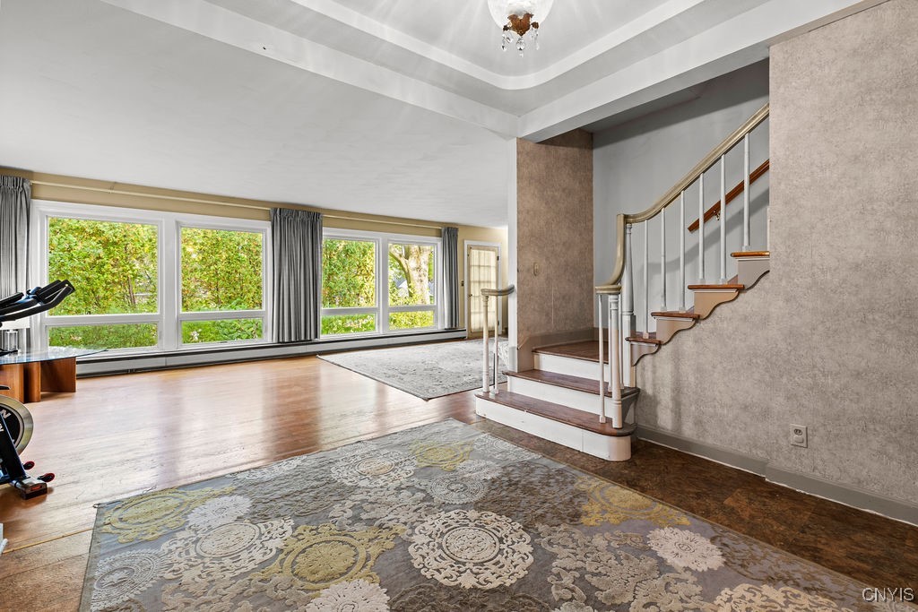 808 Velasko Road, Unit S Syracuse, NY 13207 - Photo 26 of 50 Grand front foyer showcases a chandelier and elega