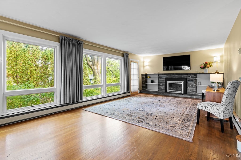 808 Velasko Road, Unit S Syracuse, NY 13207 - Photo 29 of 50 Gather in the large living room, complete with har