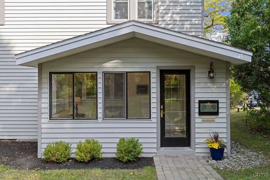 808 Velasko Road, Unit S Syracuse, NY 13207 - Photo 5 of 50 An enclosed porch offers extra living space and is