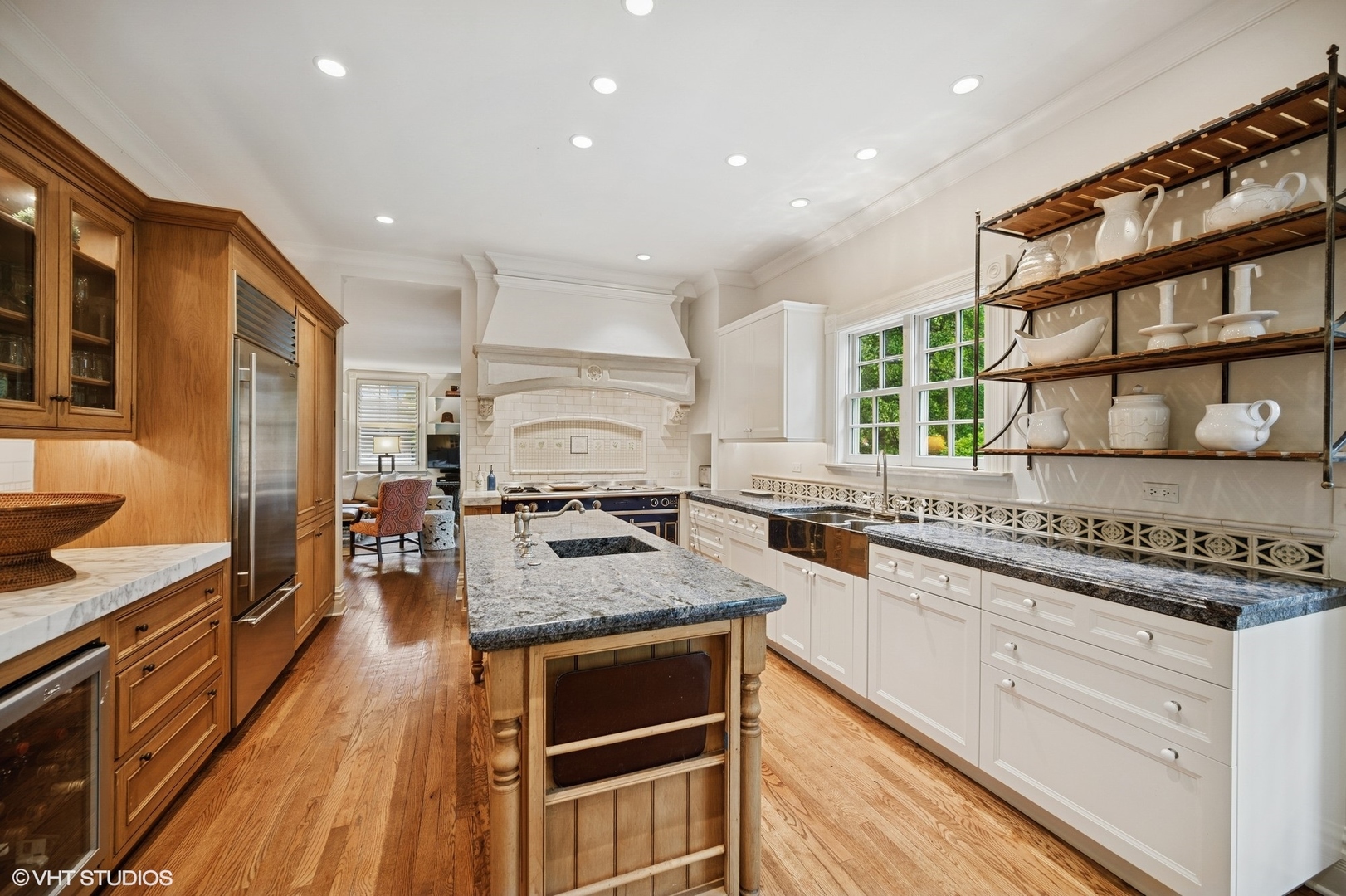 475 Maple Street Winnetka, IL 60093 - Photo 11 of 52 a kitchen with stainless steel appliances granite countertop a stove and a sink