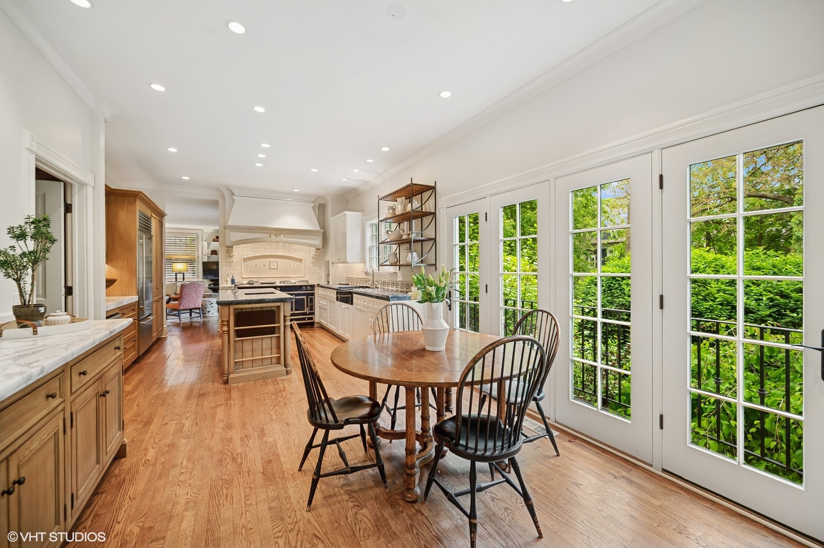 475 Maple Street Winnetka, IL 60093 - Photo 12 of 52 a dining room with furniture window wooden floor