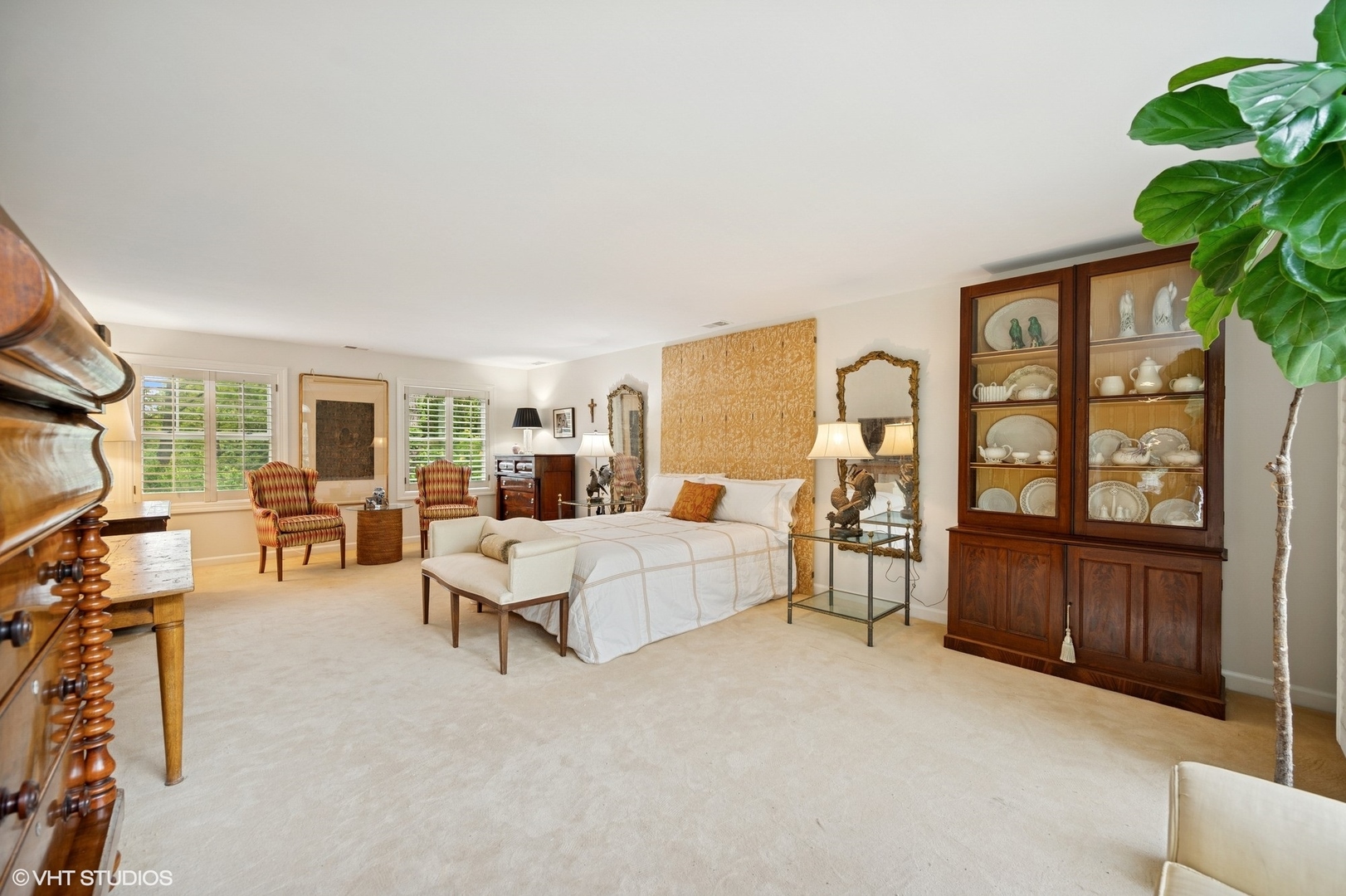 475 Maple Street Winnetka, IL 60093 - Photo 28 of 52 a living room with furniture a large window and potted plants