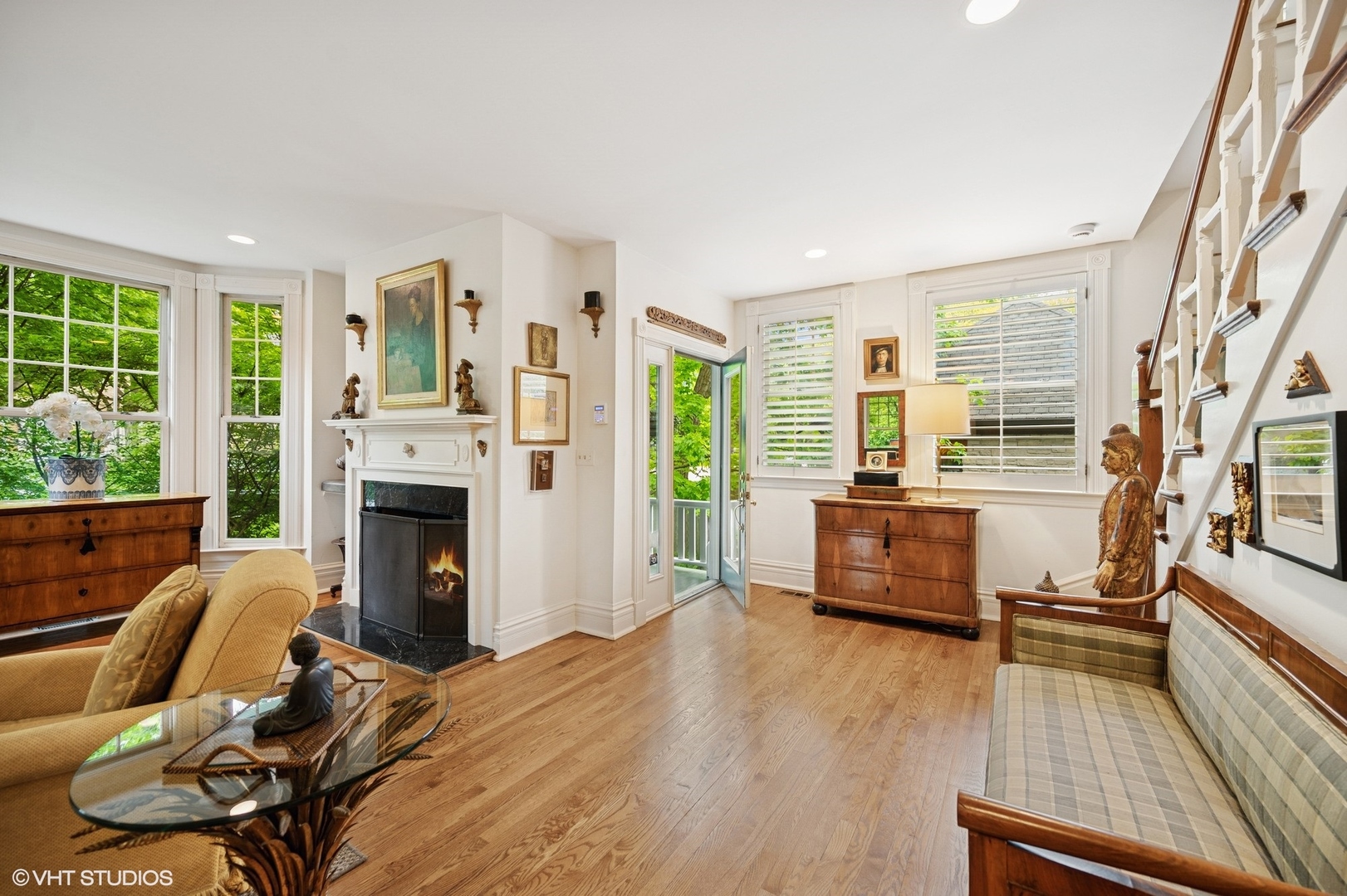 475 Maple Street Winnetka, IL 60093 - Photo 6 of 52 a living room with furniture and a fireplace