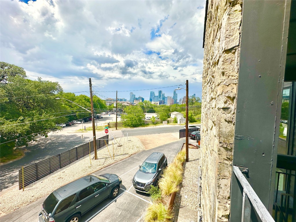 201 Academy Drive, Unit 201 Austin, TX 78704 - Photo 12 of 15 a view of balcony with yard