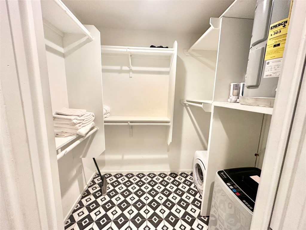 201 Academy Drive, Unit 201 Austin, TX 78704 - Photo 7 of 15 a bathroom with a sink and a mirror