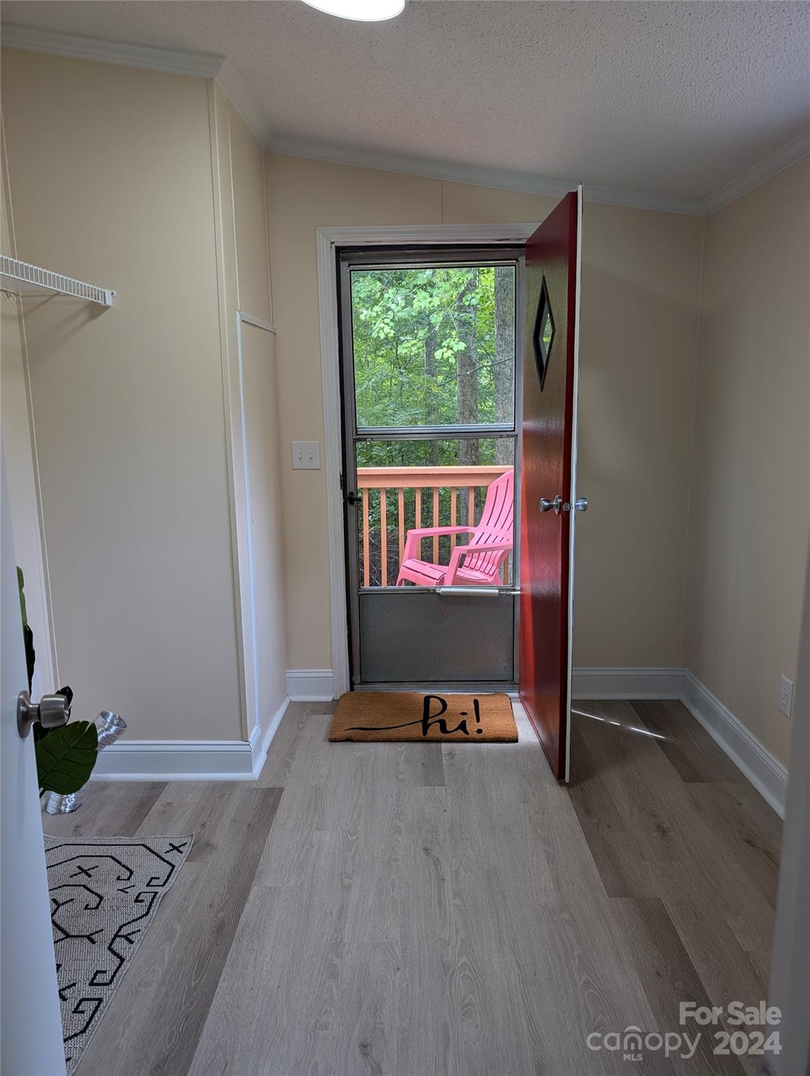 1450 Quarry Road Woodleaf, NC 27054 - Photo 17 of 23 a view of an empty room with a window