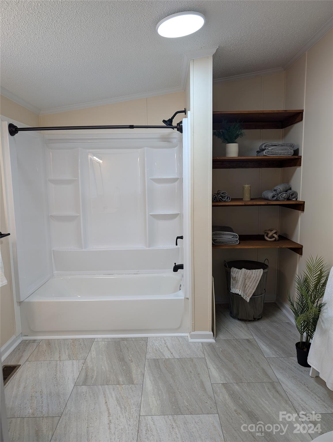 1450 Quarry Road Woodleaf, NC 27054 - Photo 18 of 23 a bathroom with a bathtub and a shower