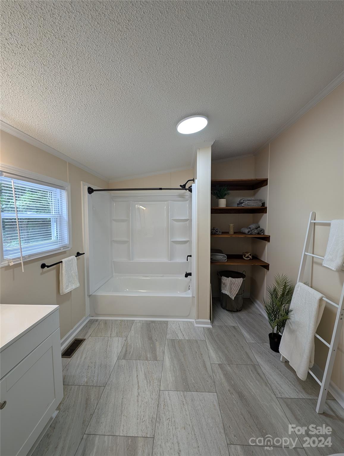 1450 Quarry Road Woodleaf, NC 27054 - Photo 19 of 23 a view of an empty room and a bathroom