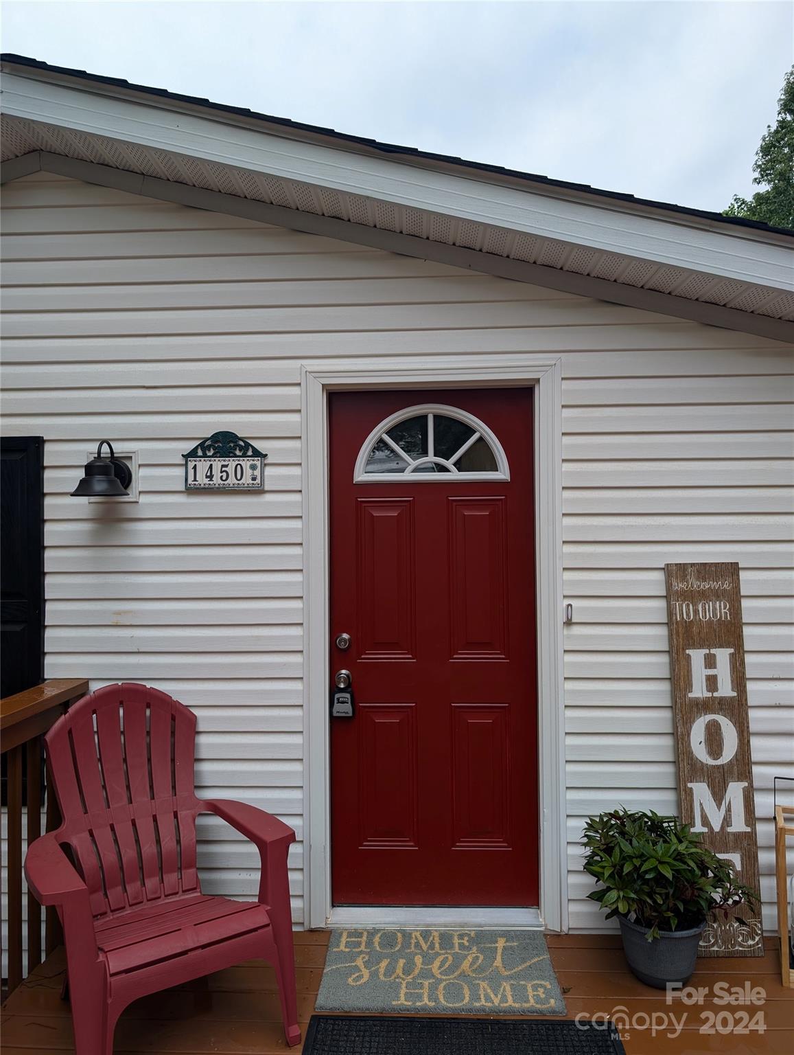 1450 Quarry Road Woodleaf, NC 27054 - Photo 6 of 23 a view of a porch with furniture