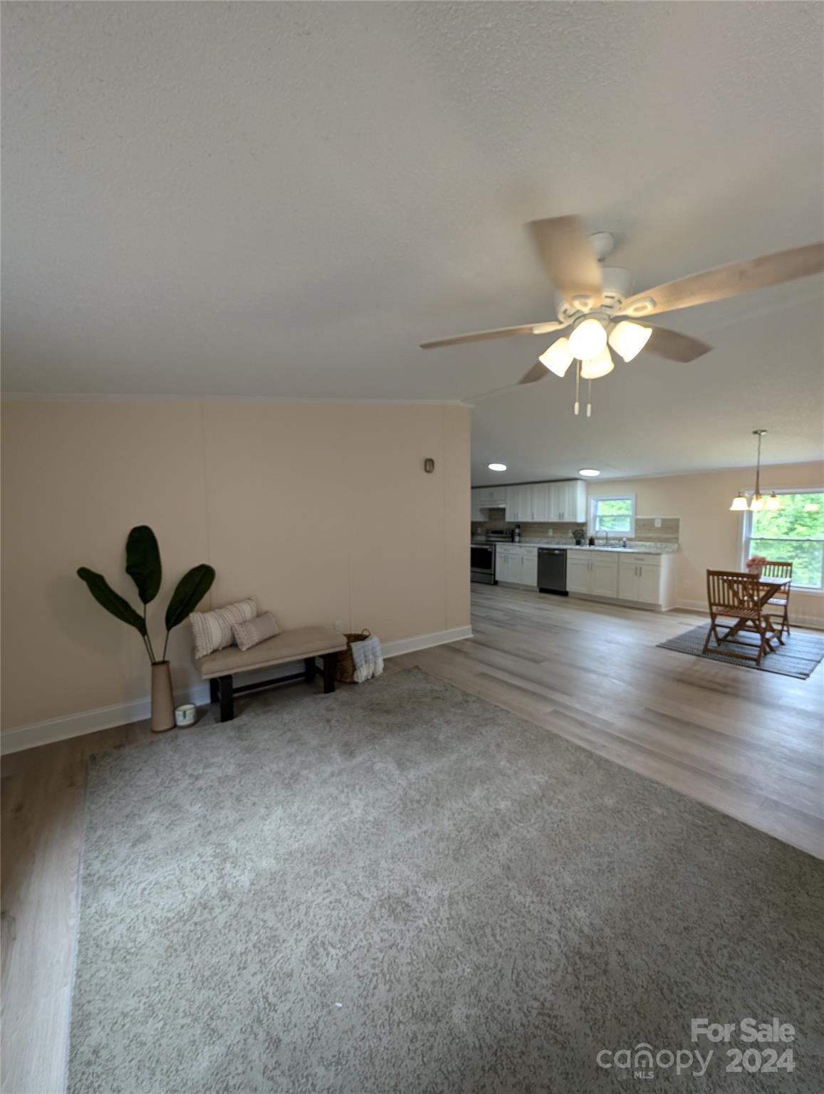 1450 Quarry Road Woodleaf, NC 27054 - Photo 9 of 23 a view of a room with gym equipment and view of living room