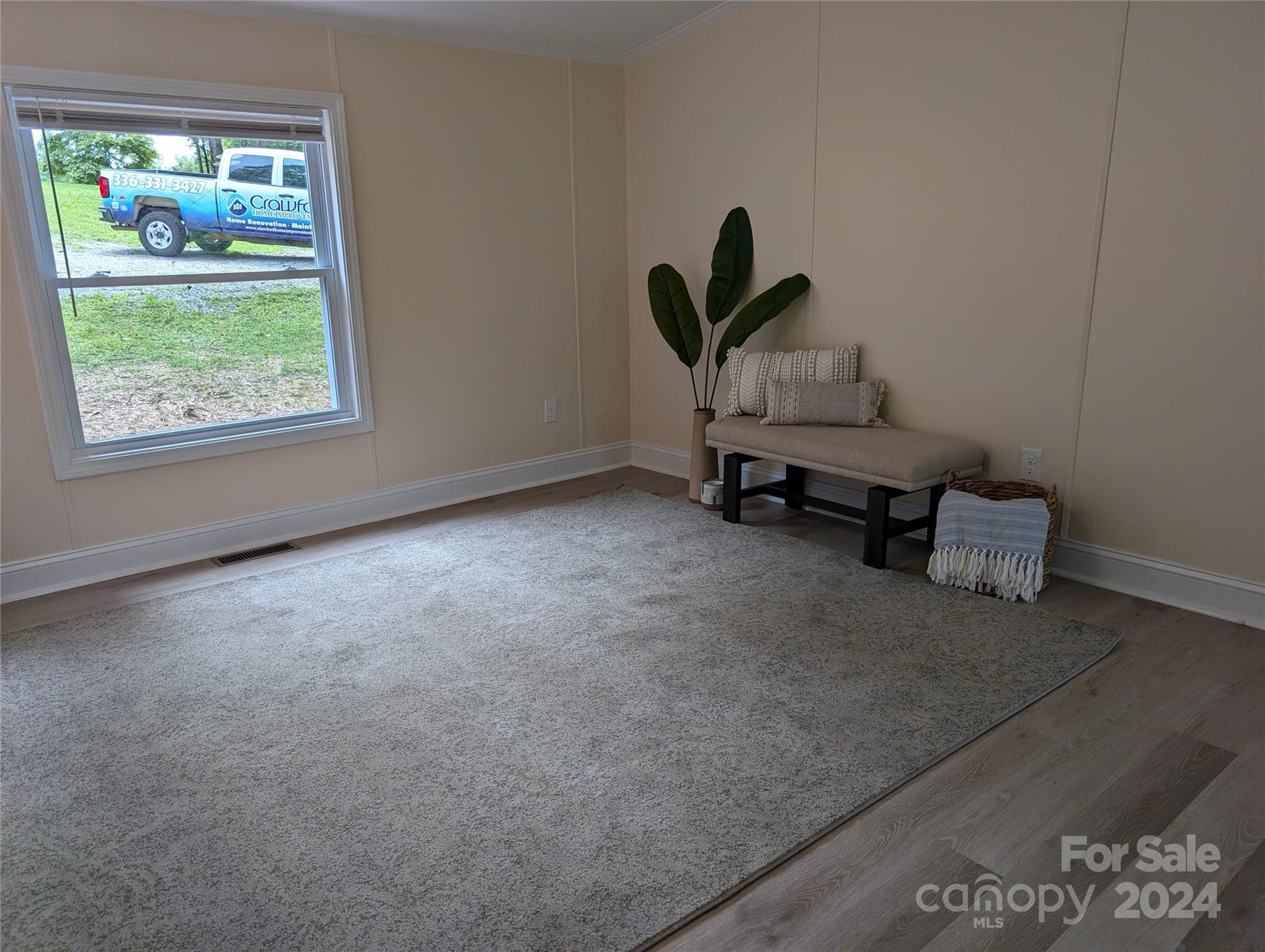 1450 Quarry Road Woodleaf, NC 27054 - Photo 10 of 23 a room with furniture and a window