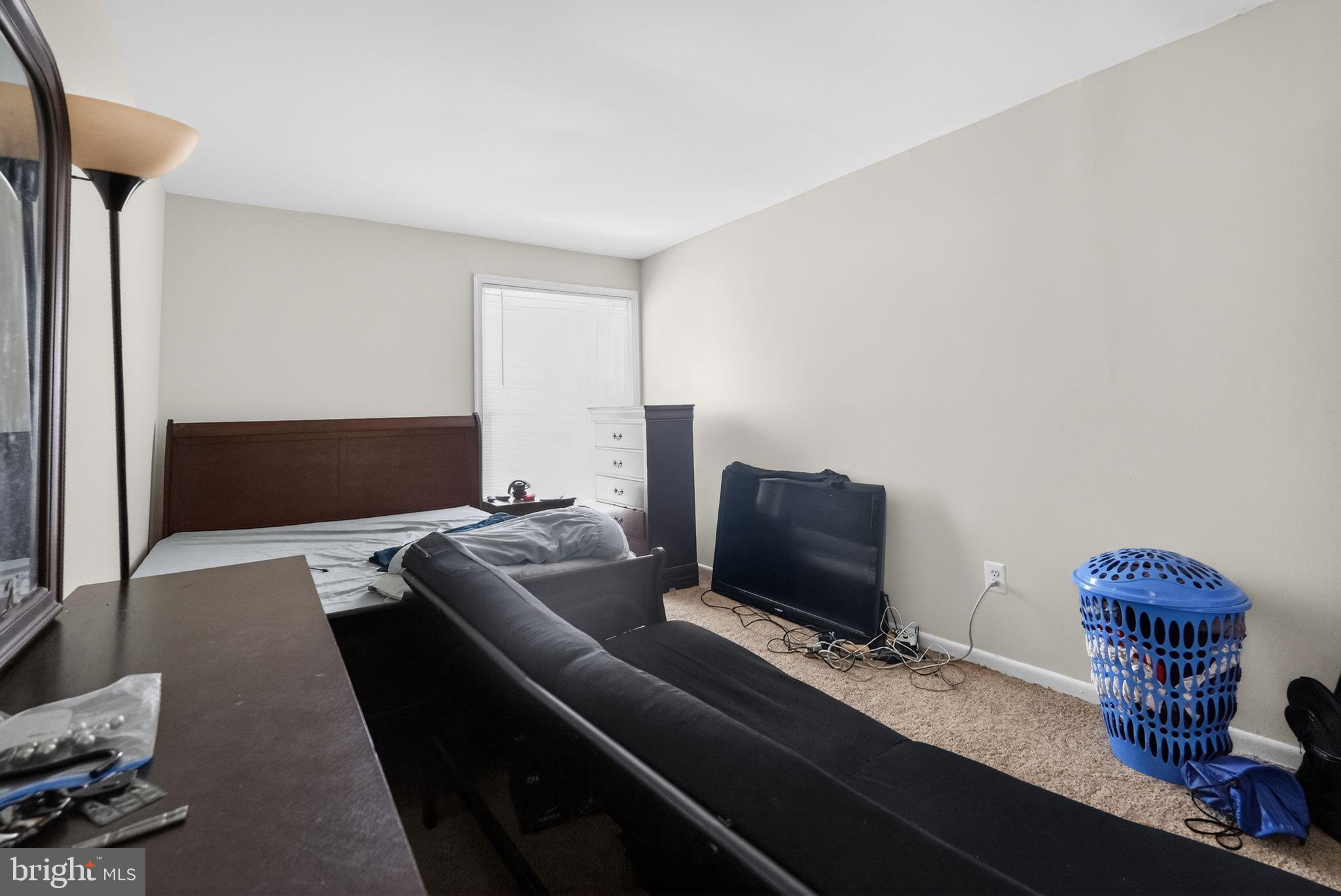 8587 Seasons Way, Unit 6B Lanham, MD 20706 - Photo 10 of 17 a living room with furniture