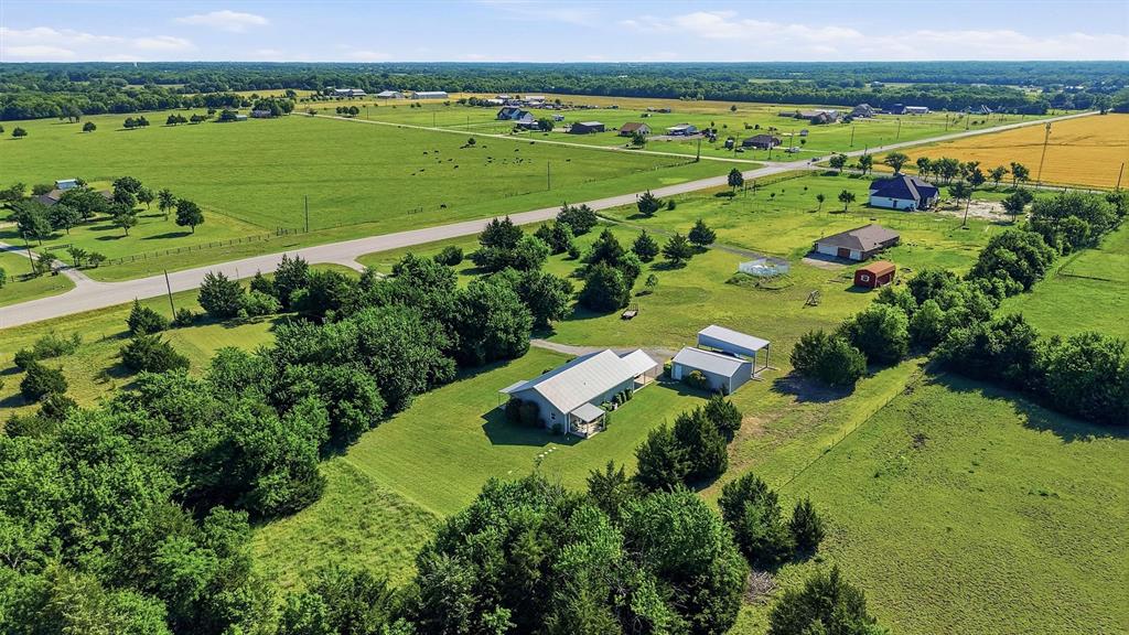 15656 South State Highway 78 Blue Ridge, TX 75424 - Photo 5 of 36 an aerial view of a houses with outdoor space and a lake view