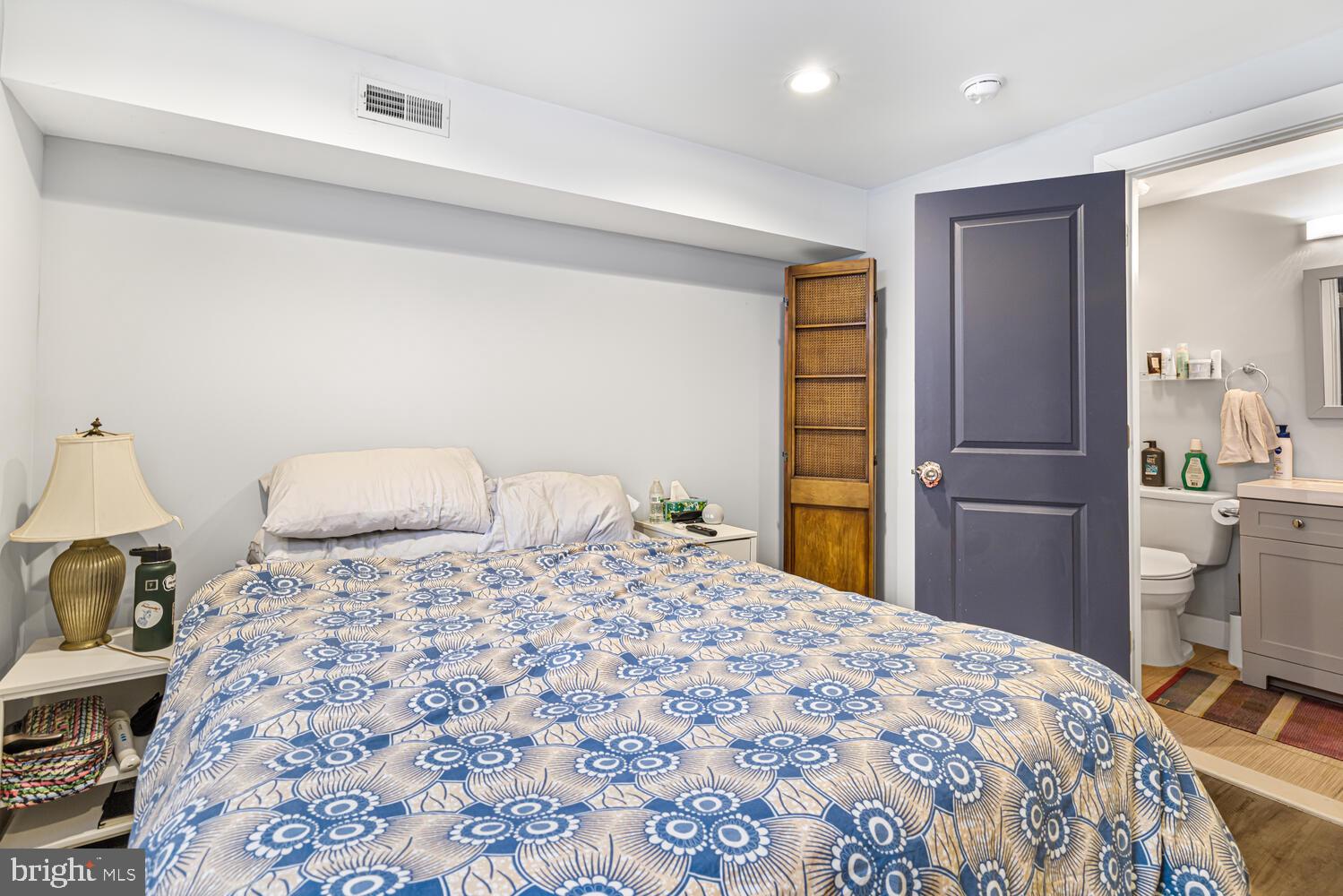 1214 South 20th Street Philadelphia, PA 19146 - Photo 23 of 34 a bedroom with a bed and a cabinets