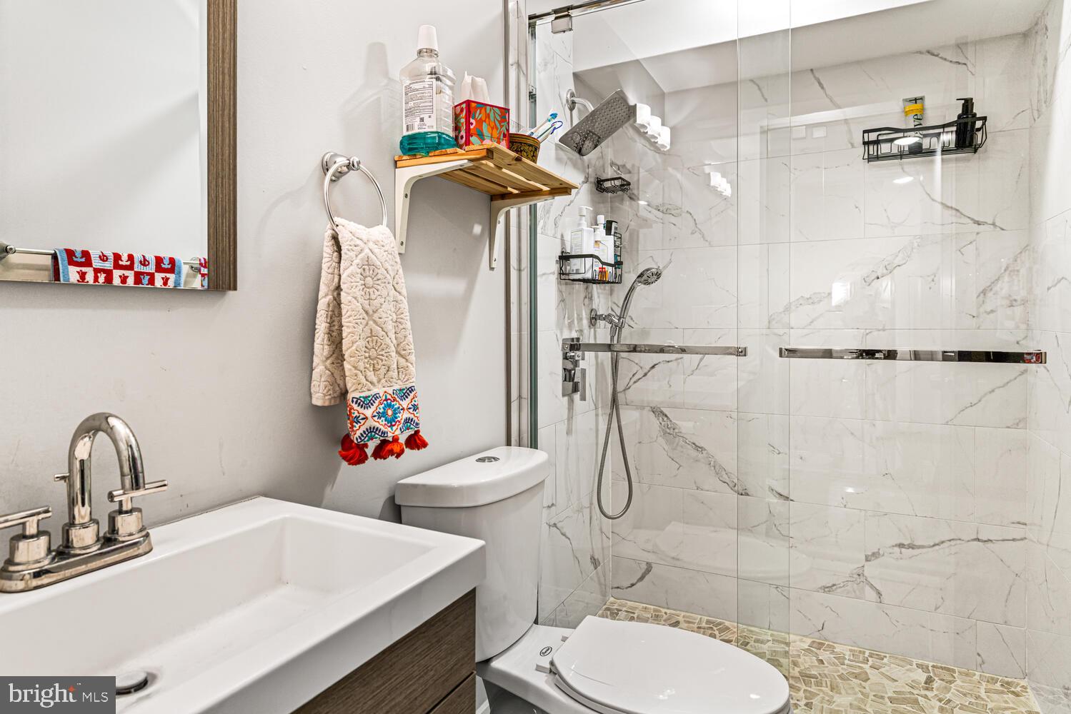 1214 South 20th Street Philadelphia, PA 19146 - Photo 32 of 34 a bathroom with a sink toilet and shower