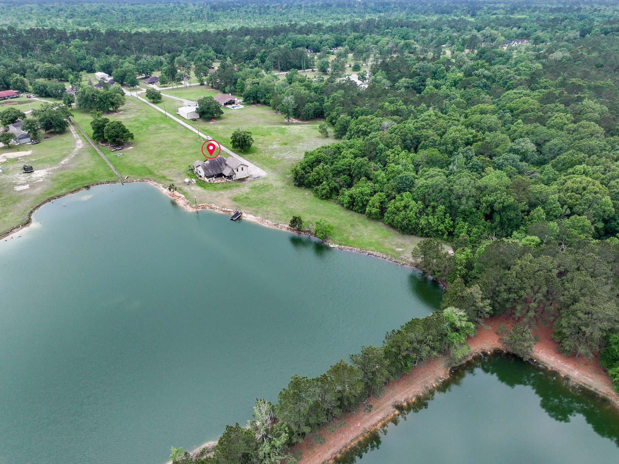 10573 Cooks Lake Road Lumberton, TX 77657 - Photo 46 of 47 an aerial view of residential houses with outdoor space and trees