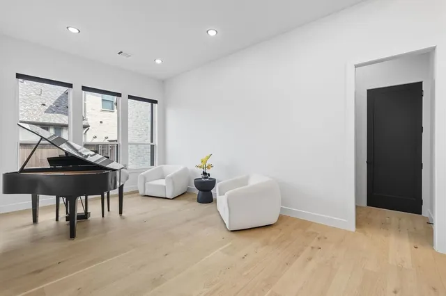a kitchen with stainless steel appliances kitchen island granite countertop a sink and cabinets