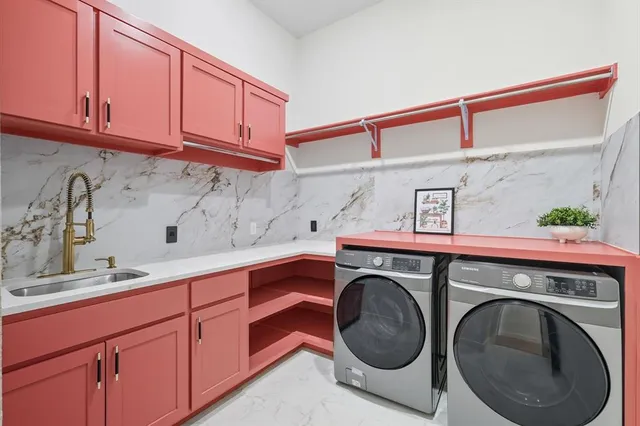 a spacious bathroom with a granite countertop sink and a mirror