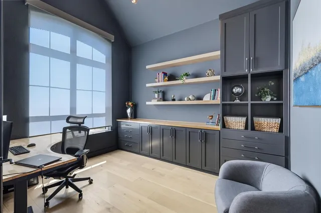 a living room with furniture a rug and a window