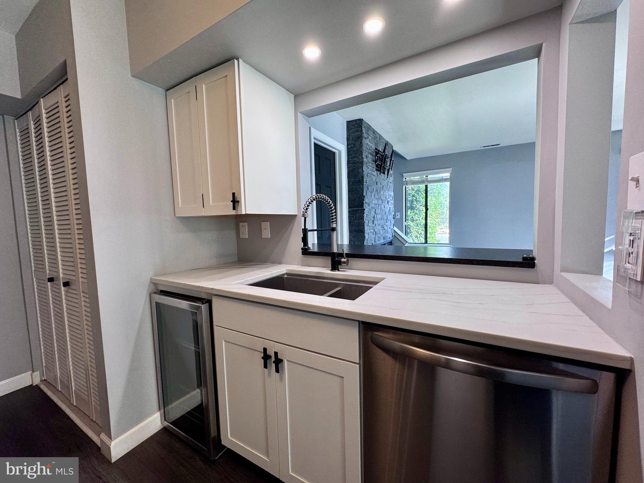 1403 Roberts Way Voorhees, NJ 08043 - Photo 9 of 22 a kitchen with a sink stove and cabinets