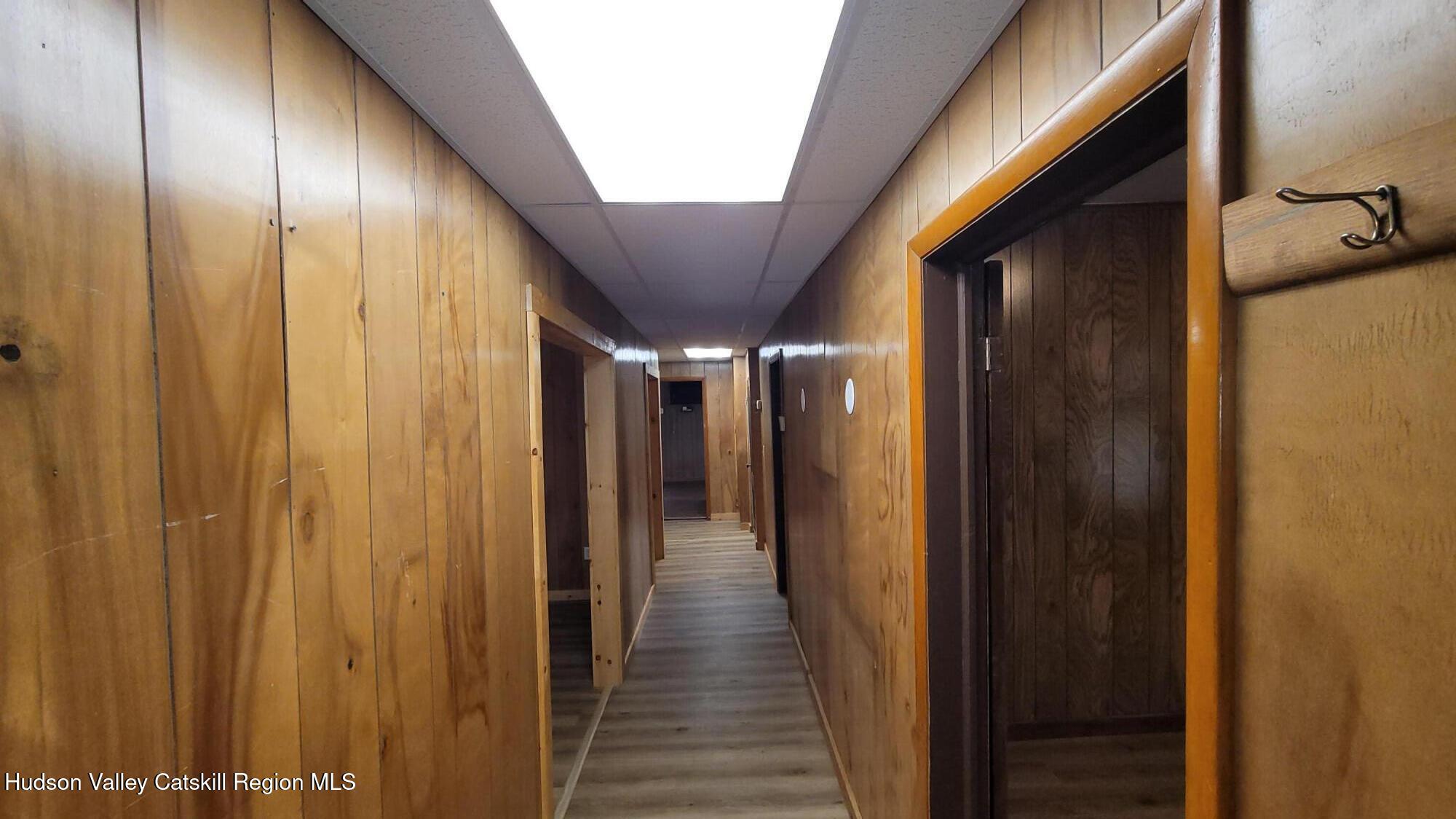 6074 Rte 9W Catskill, NY 12414 - Photo 5 of 15 a view of a hallway with wooden floor