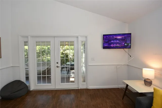a view of a livingroom with furniture and wooden floor