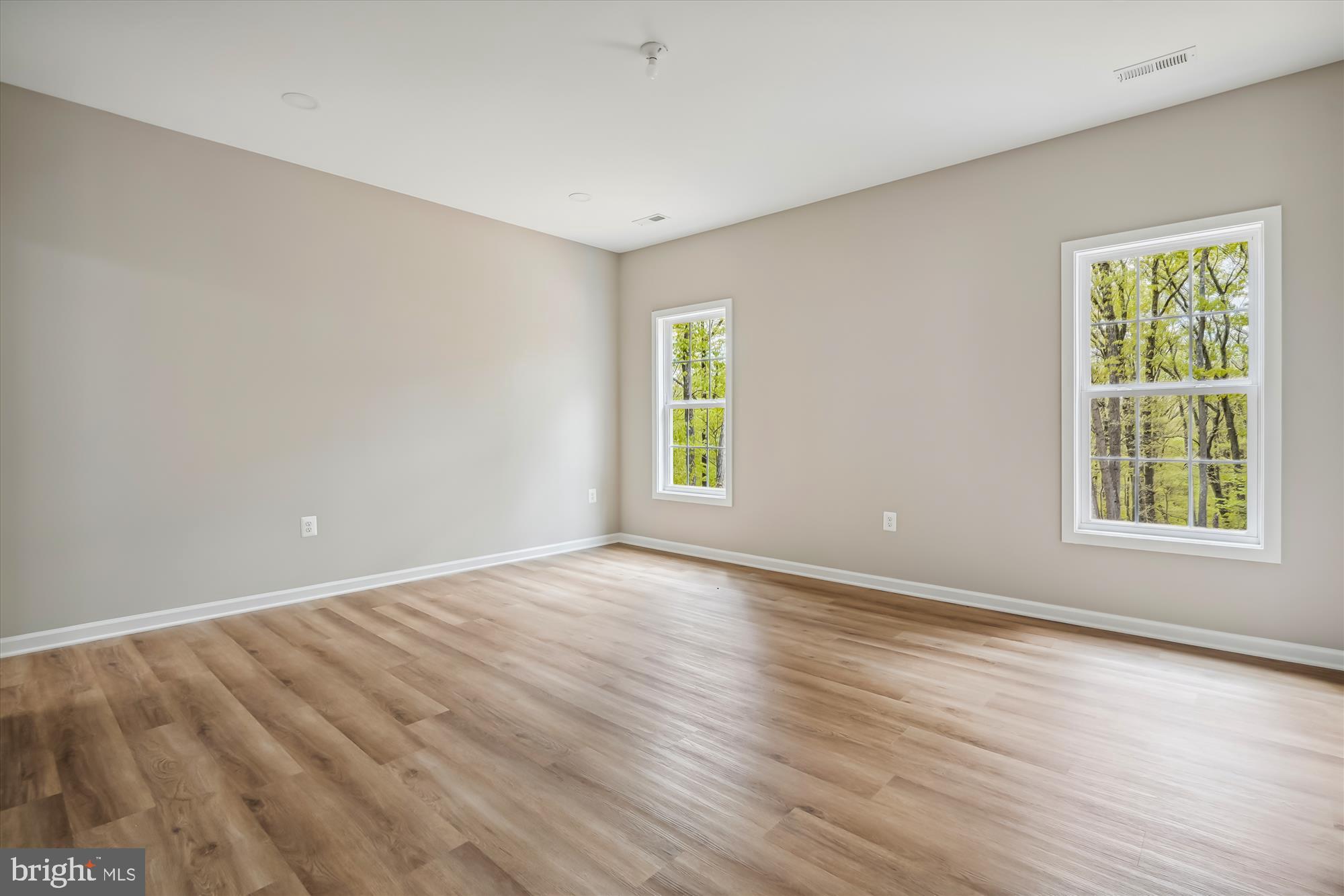 2 Eggbornsville Road Rixeyville, VA 22737 - Photo 34 of 63 a view of an empty room with wooden floor and a window