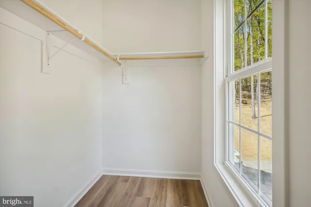 a view of a room with racks on the wall