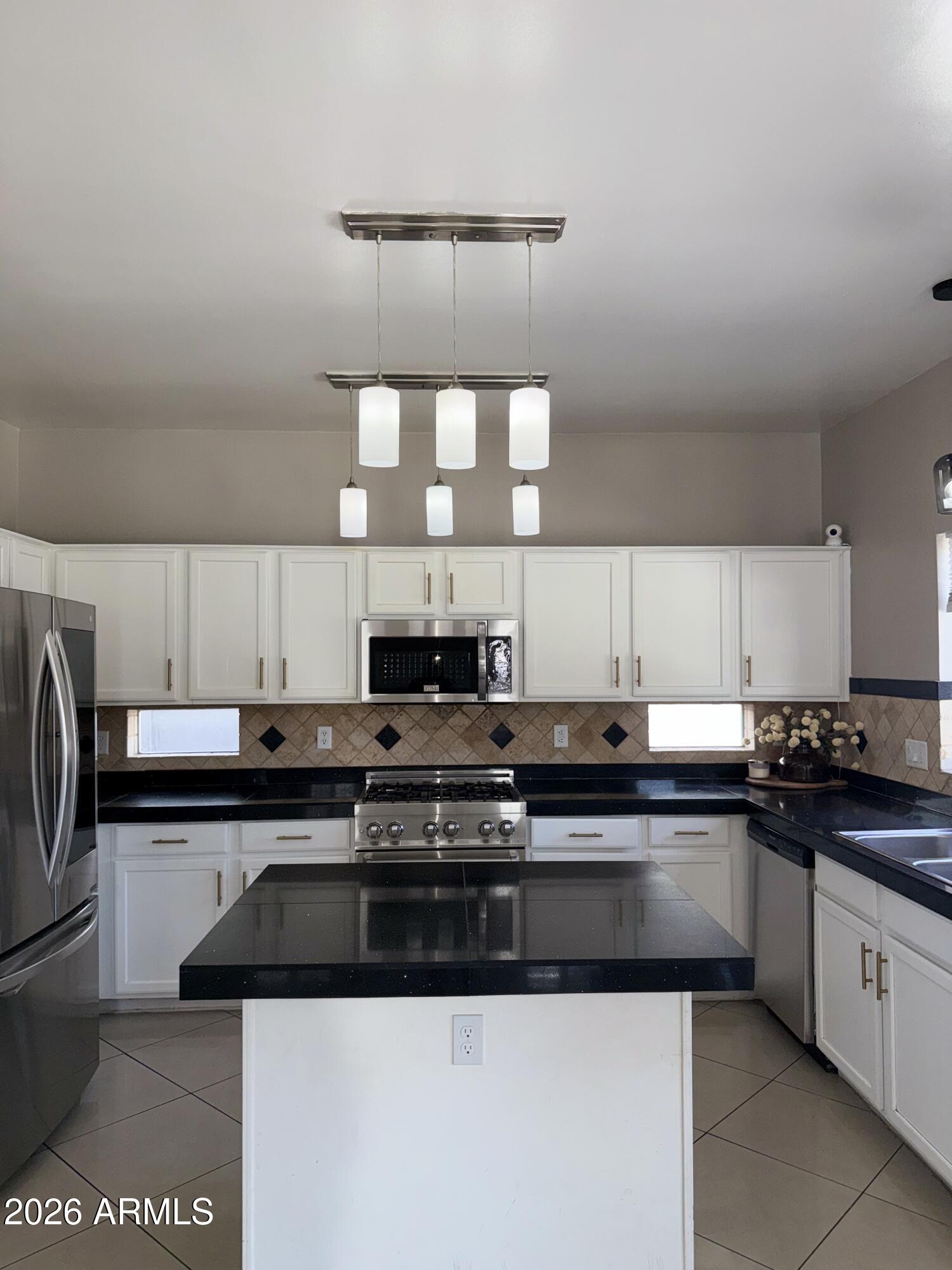 9009 West Monte Vista Road Phoenix, AZ 85037 - Photo 2 of 10 IMG_4771