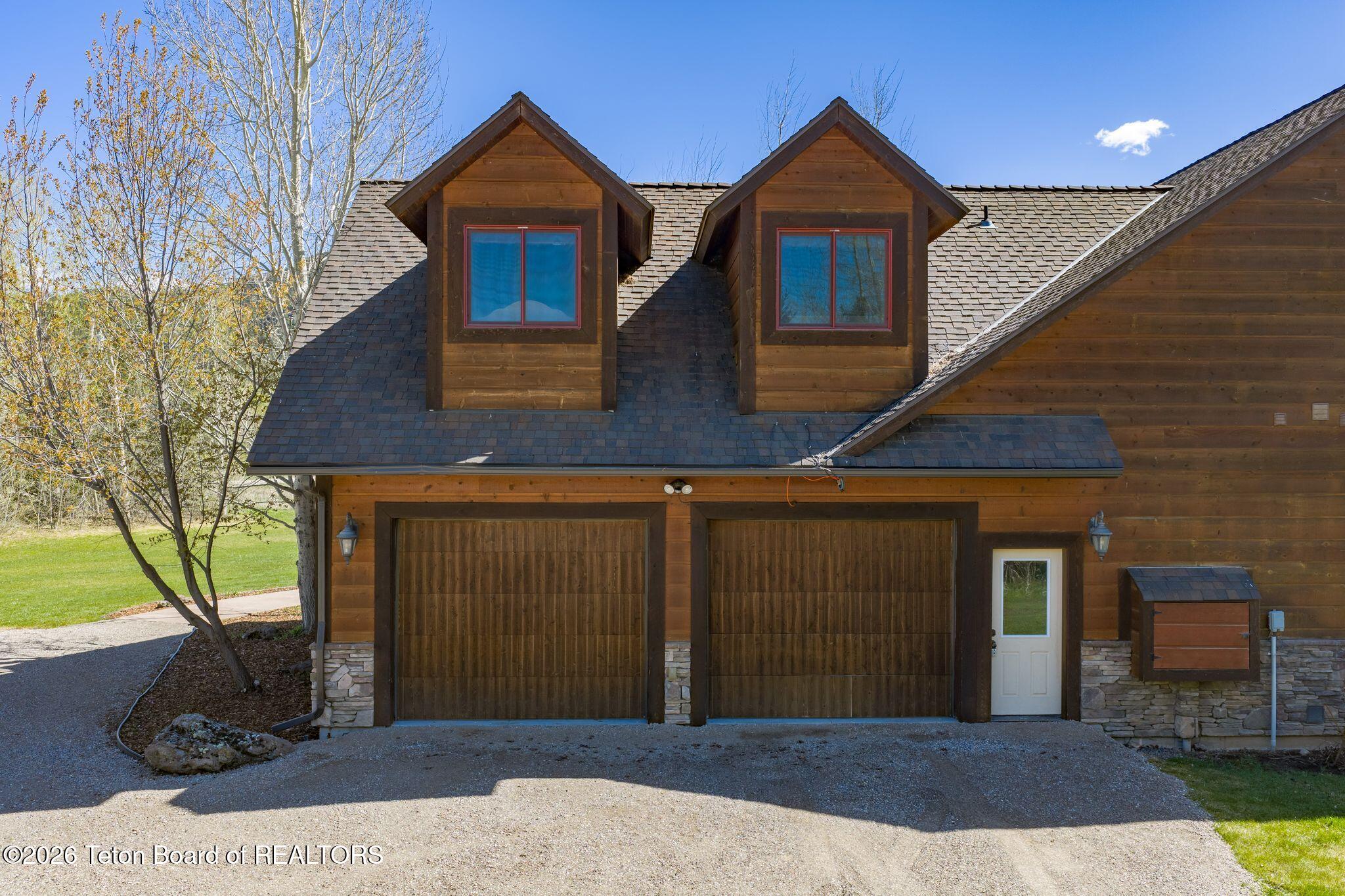 10128 West 2000 South Victor, ID 83455 - Photo 4 of 94 10128 W2000S Exterior-3