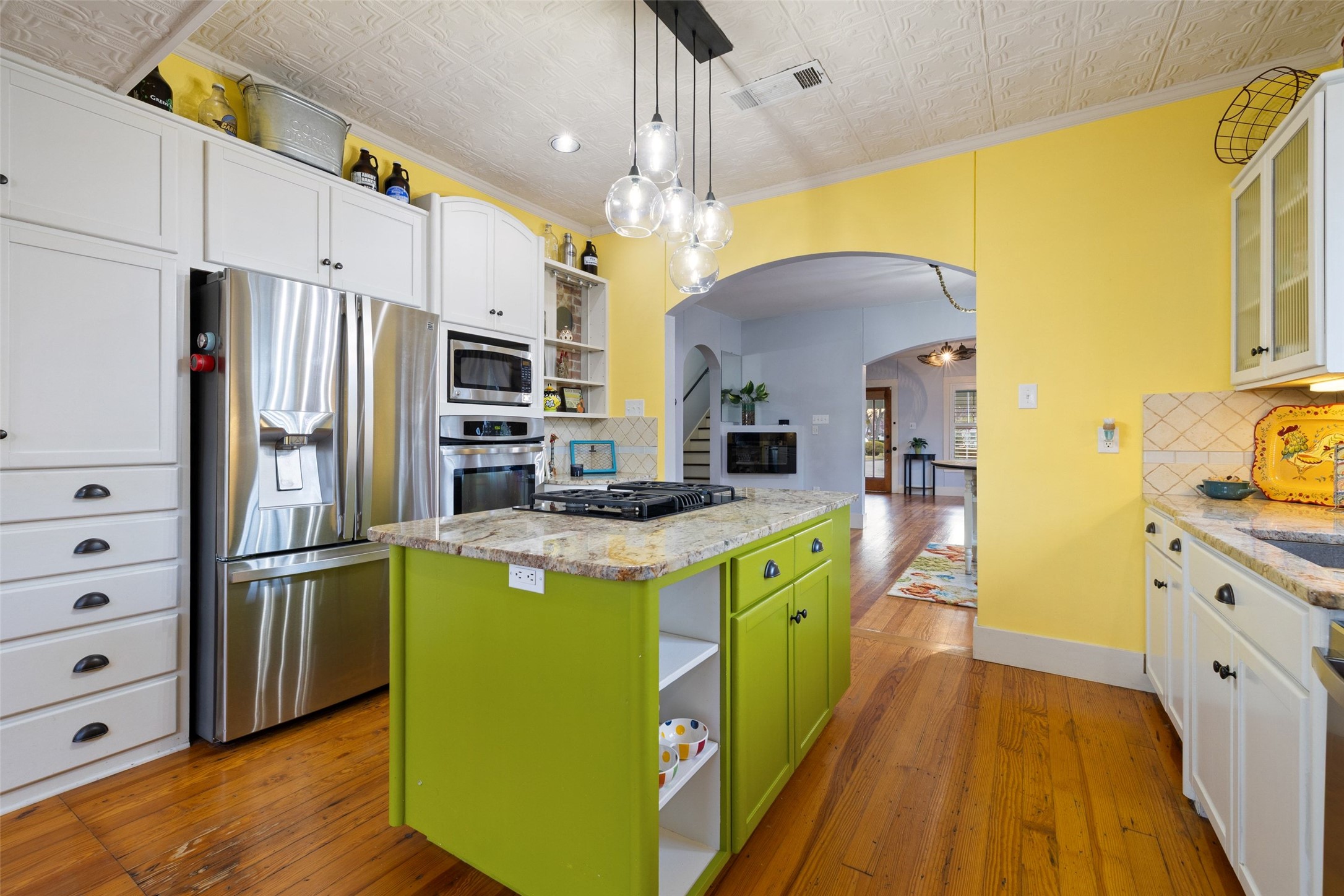1507 South Church Street Georgetown, TX 78626 - Photo 16 of 40 a kitchen that has a lot of cabinets a sink and a refrigerator