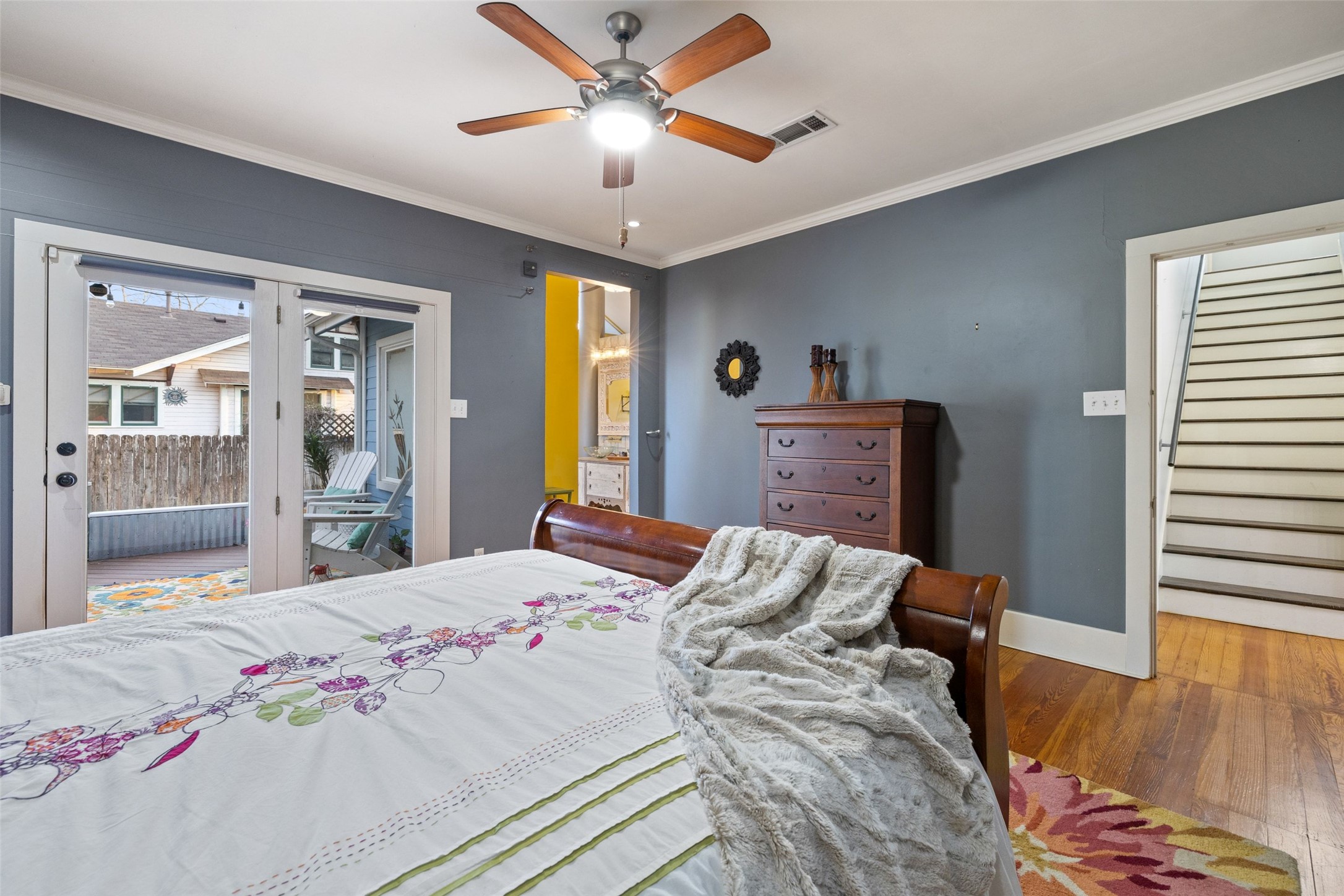 1507 South Church Street Georgetown, TX 78626 - Photo 21 of 40 a bedroom with a bed chandelier and a window