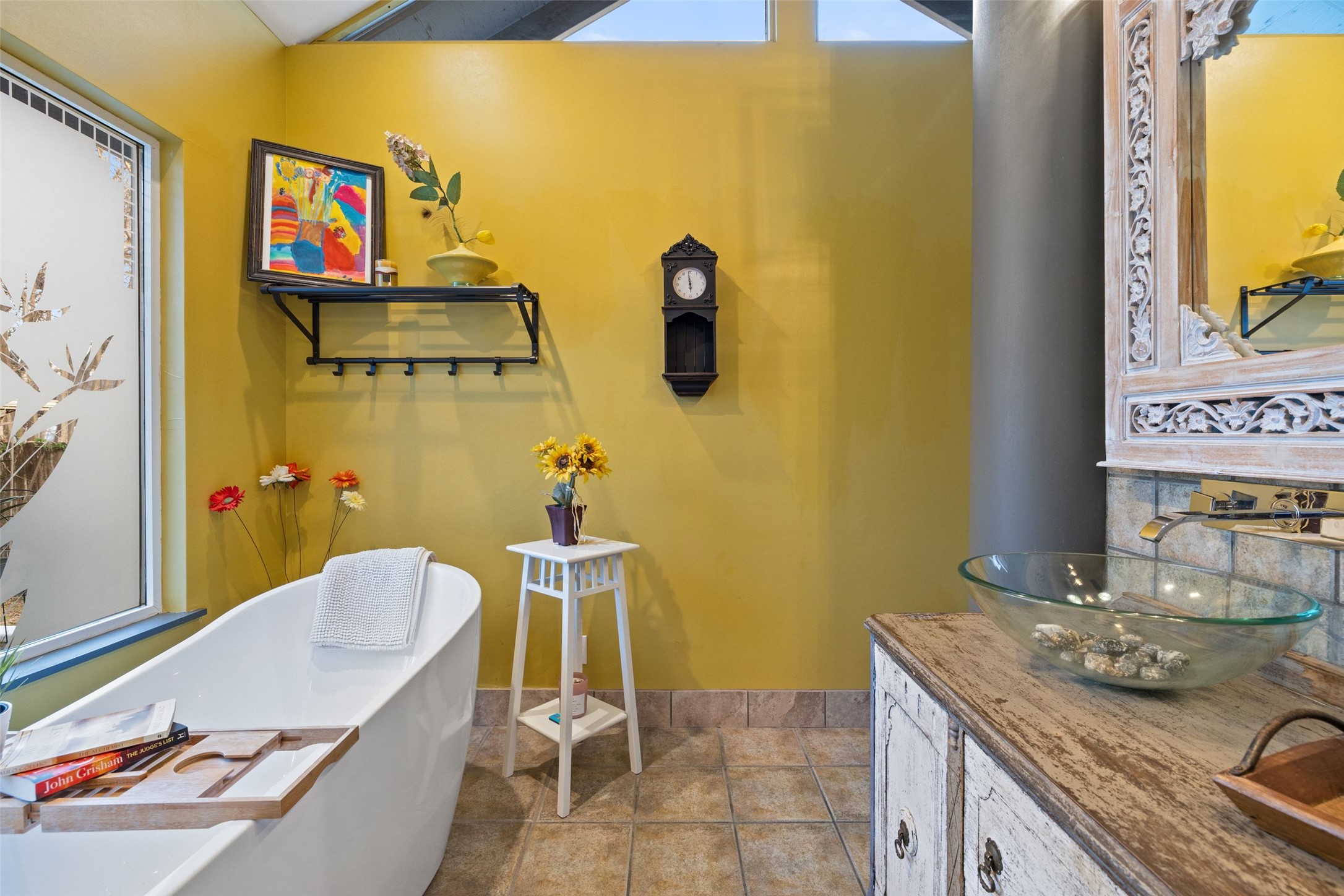 1507 South Church Street Georgetown, TX 78626 - Photo 25 of 40 a bathroom with a granite countertop sink and a mirror