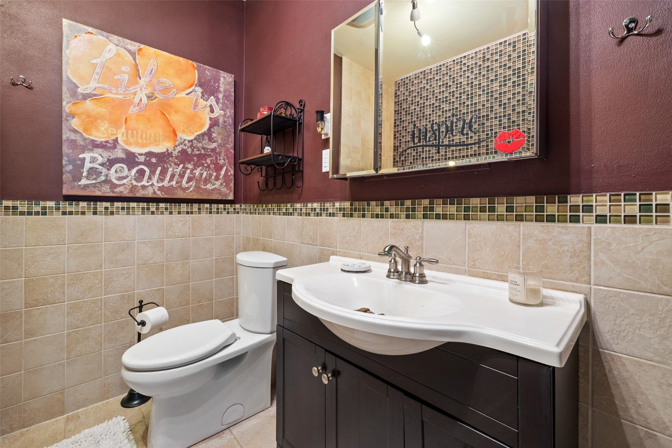 1507 South Church Street Georgetown, TX 78626 - Photo 27 of 40 a bathroom with a sink mirror and toilet
