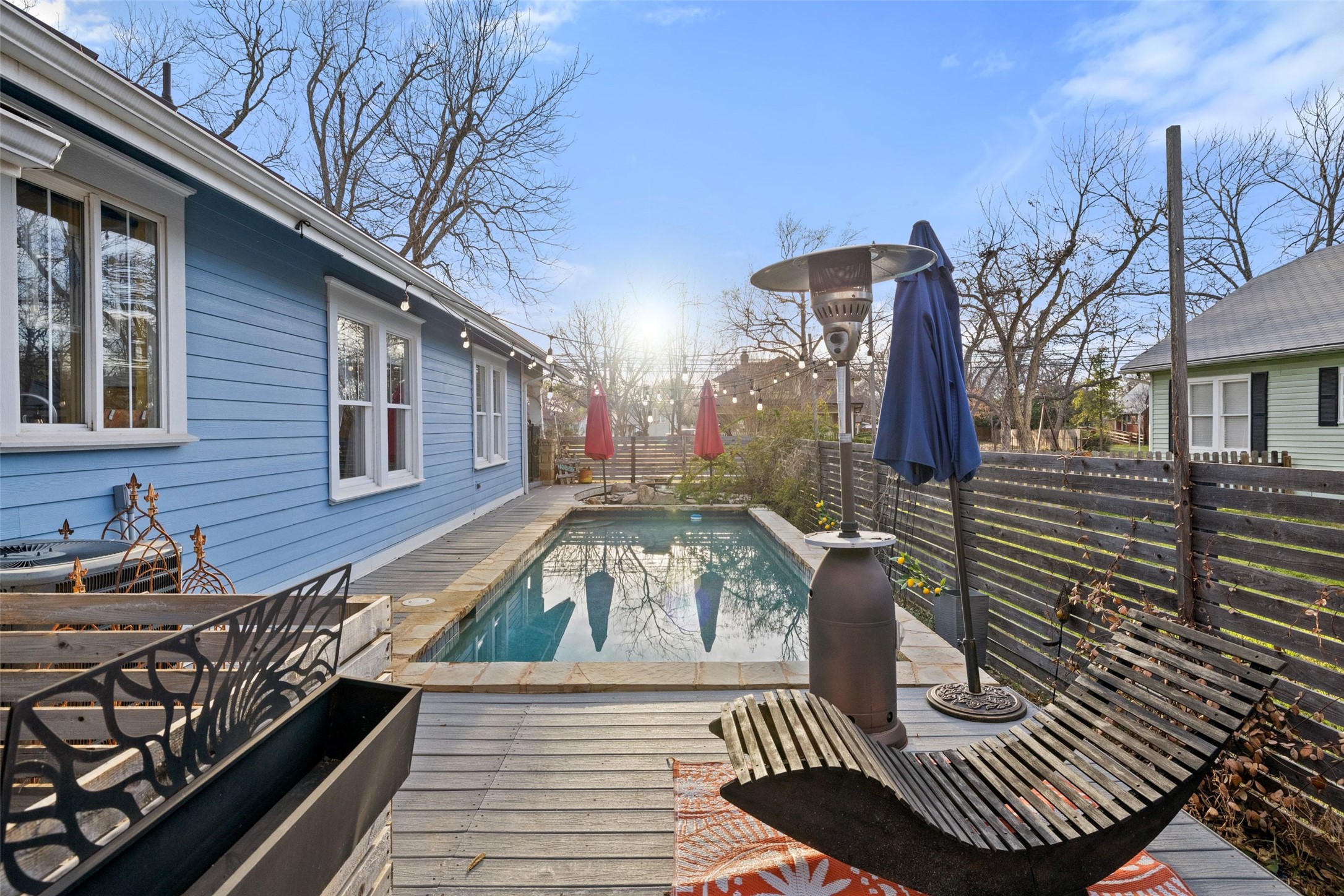 1507 South Church Street Georgetown, TX 78626 - Photo 30 of 40 a view of a roof deck with couches and wooden floor