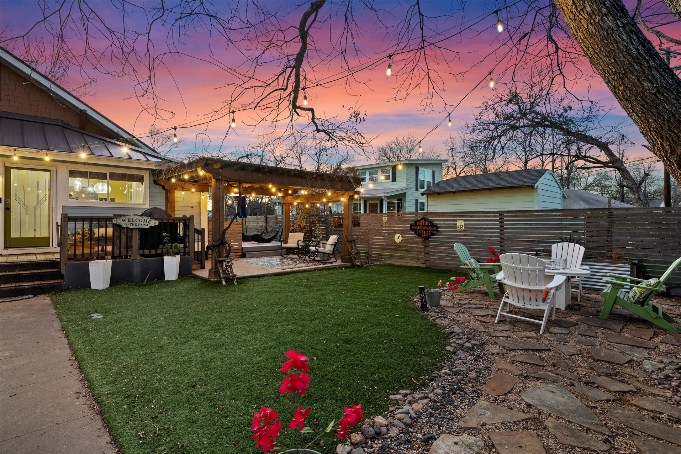 1507 South Church Street Georgetown, TX 78626 - Photo 34 of 40 a view of a house with backyard sitting area and garden