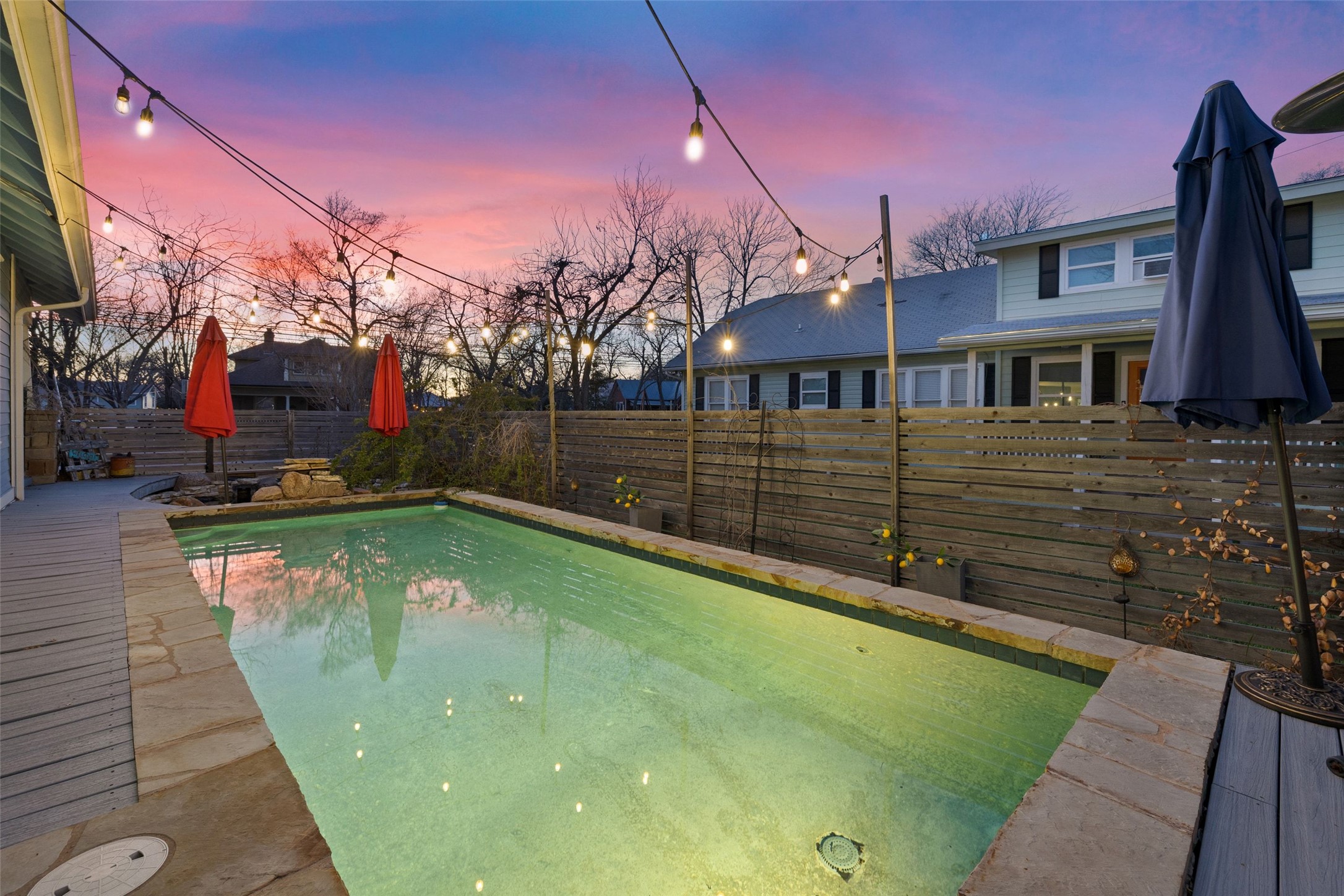 1507 South Church Street Georgetown, TX 78626 - Photo 36 of 40 a view of a swimming pool with a house